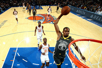 Kevin Durant #35 of the Golden State Warriors dunks the ball