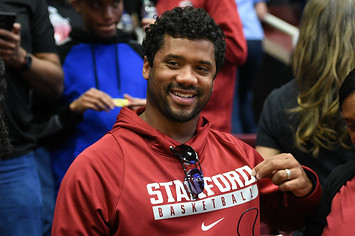 Russell Wilson celebrates after the Cardinals win