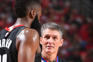 NBA referee Scott Foster talks with James Harden