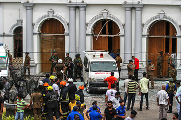 Sri Lankan security forces secure the area around St. Anthony's Shrine