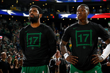 Kyrie Irving #11 and Terry Rozier #12 of the Boston Celtics