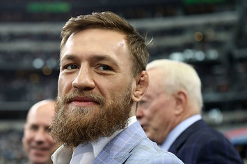 Conor McGregor is seen on the sidelines before the NFL game