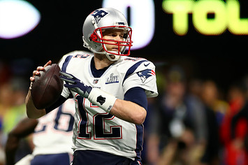 Tom Brady #12 of the New England Patriots makes a pass against the Los Angeles Rams