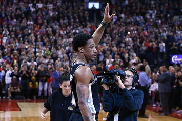 DeMar DeRozan waves to the Toronto crowd in his first game back.