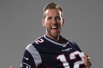 Harry Kane posing in New England Patriots Tom Brady #12 jersey