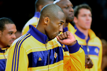 Lakers Kobe Bryant kisses his championship ring