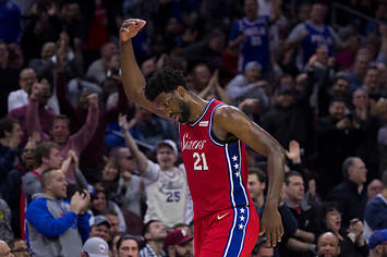 Joel Embiid invites the crowd to make some noise.