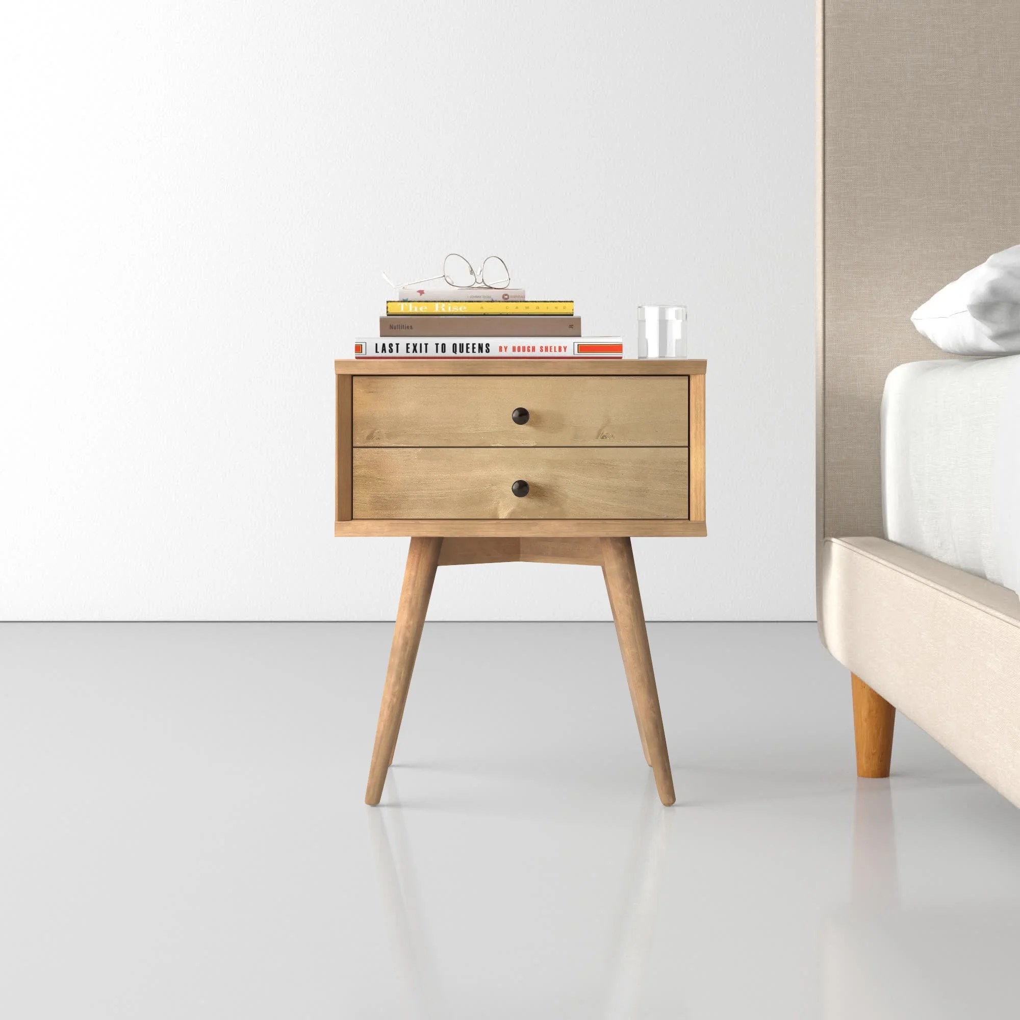 The nightstand with two drawers and splayed legs