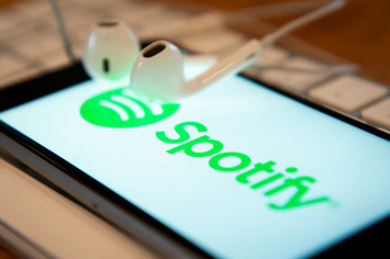 A phone with a Spotify music application