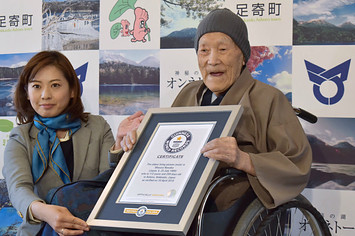 Masazo Nonaka receives a certificate for the Guinness World Records