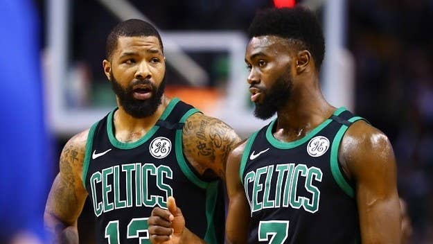 A fan video shows Boston Celtics teammates Jaylen Brown and Marcus Morris getting into a heated exchange during a timeout in Thursday's loss to the Miami Heat.