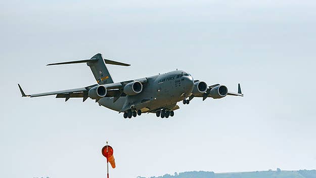Residents freaked out when a Air Force C-17A Globemaster III made an unannounced low pass over the city on Friday morning.