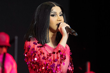 Cardi B is seen performing for fans at a festival