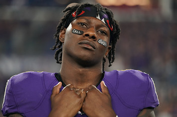 Marquise Brown stands during the national anthem prior to an NFL game.
