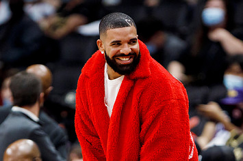 Drake attends a preseason NBA game between the Toronto Raptors and the Houston Rockets