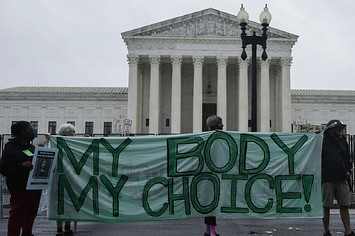 Activists with "Rise Up 4 Abortion" demonstrate outside the U.S. Supreme Court Building
