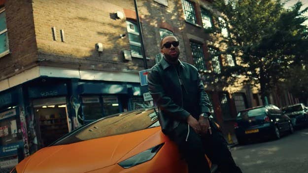 The visual shows the Bay Area rapper in East London, showing his orange Lamborghini, getting some grub with a lady friend, and taking in the city views.