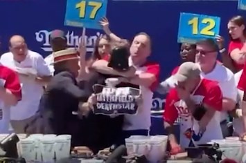Joey Chestnut choking this guy OUT