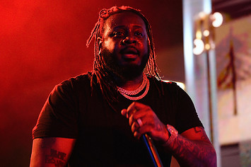 T-Pain performing onstage during event.