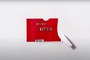 A look at an old school Netflix envelope is pictured
