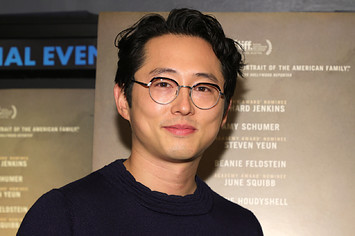 Steven Yeun seen on the red carpet of a movie screening.