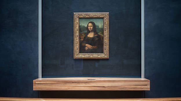 A man who disguised himself as an old woman has been arrested after he smeared cake across the glass protecting the 'Mona Lisa' at the Louvre in Paris.