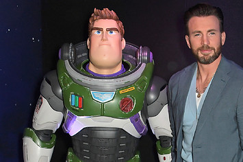 Chris Evans poses with Buzz Lightyear at "Lightyear" UK Premiere.