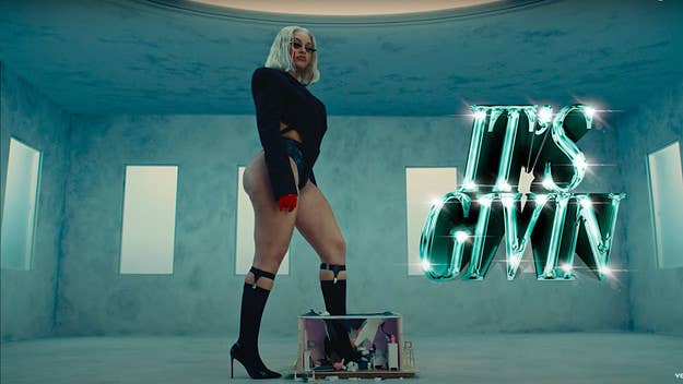 Latto has released the star-studded video for her track "It's Givin," with cameo appearances from Ella Mai, Flo Milli, Angie Martinez, and more.