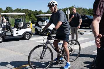 Photograph of Joe Biden on bike before fall