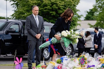 Vice President Kamala Harris and Second Gentleman Doug Emhoff pay their respects