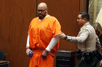 Suge Knight enters Los Angeles Superior Court for his arraignment on October 27, 2015
