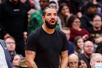 Rapper Drake watches Game Three of the Eastern Conference First Round between the Toronto Raptors and the Philadelphia 76ers