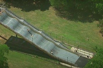 The notorious Giant Slide attraction is pictured in action