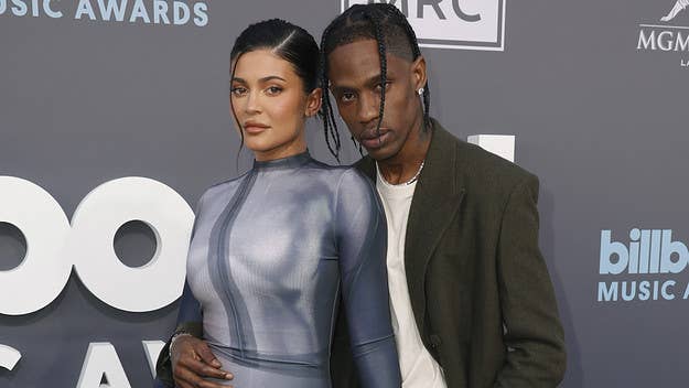 Kylie Jenner took to Instagram to post a Father's Day tribute to Travis Scott, sharing a pic of their four-month old son snuggled up with his dad and sister.