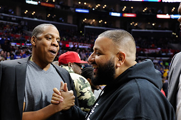 Jay and DJ Khaled attend a basketball game in 2016.
