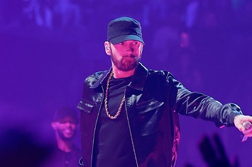 Eminem performs onstage at the 2022 MTV VMAs at Prudential Center