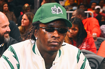 Rapper Young Thug attends the game between Golden State Warriors and the Atlanta Hawks