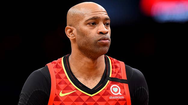 Armed burglars broke into former NBA player Vince Carter's Atlanta over the weekend and stole around $100,000 in cash, according to reports.