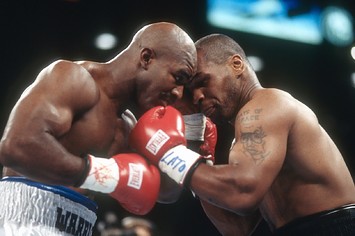 Evander Holyfield and Mike Tyson fight for WBA World Heavyweight Title on June 28,1997