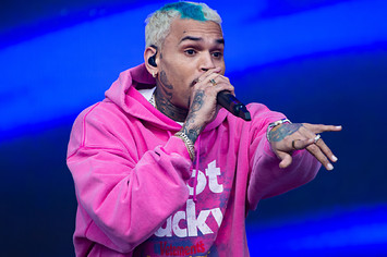 Chris Brown is seen performing at an event