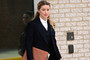 Amber Heard is pictured walking out of a court facility