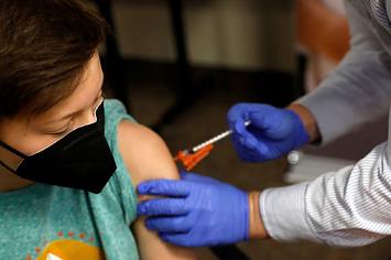 Child getting vaccinated for COVID 19