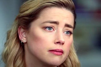 Amber Heard is seen speaking with a reporter