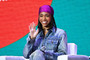 Lori Harvey speaks onstage during the 2022 Essence Festival of Culture