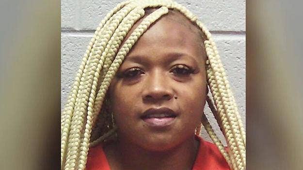A Georgia woman has been sentenced to a year in jail after pleading guilty to reckless conduct and involuntary manslaughter in the death of two men.