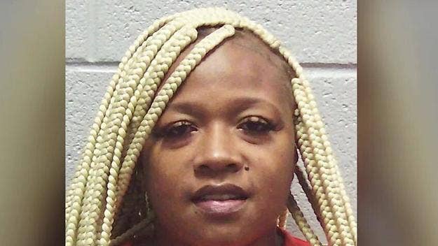 A Georgia woman has been sentenced to a year in jail after pleading guilty to reckless conduct and involuntary manslaughter in the death of two men.