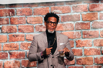 DL Hughley is seen performing comedy