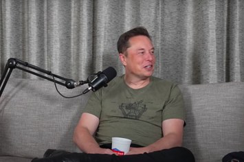 Elon Musk is seen on a podcast