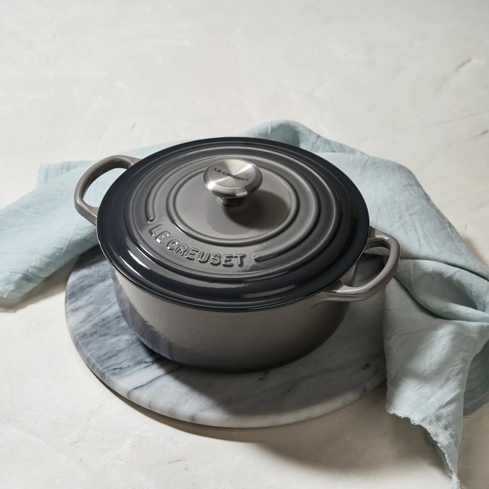 The Le Creuset Dutch oven with handles on either side and a matching lid