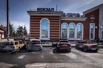 Calcinated cars are pictured outside a train station in Kramatorsk, eastern Ukraine